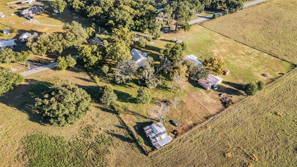 7207 Elwood Road Zephyrhills, FL 33540 - Photo 4 of 23 a view of swimming pool from a lake