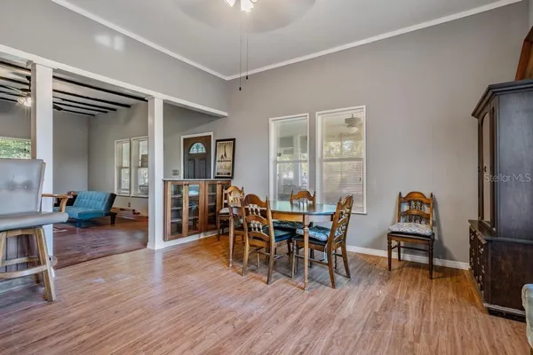 a view of a livingroom with furniture and wooden floor