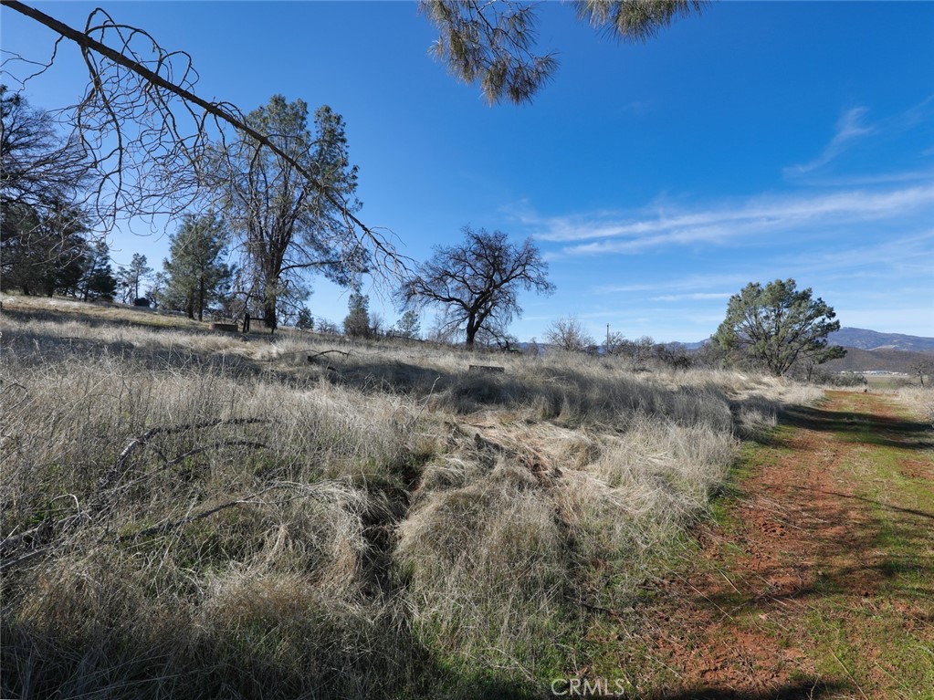 19755 Grange Road Middletown, CA 95461 - Photo 29 of 45 a view of a lake with a yard