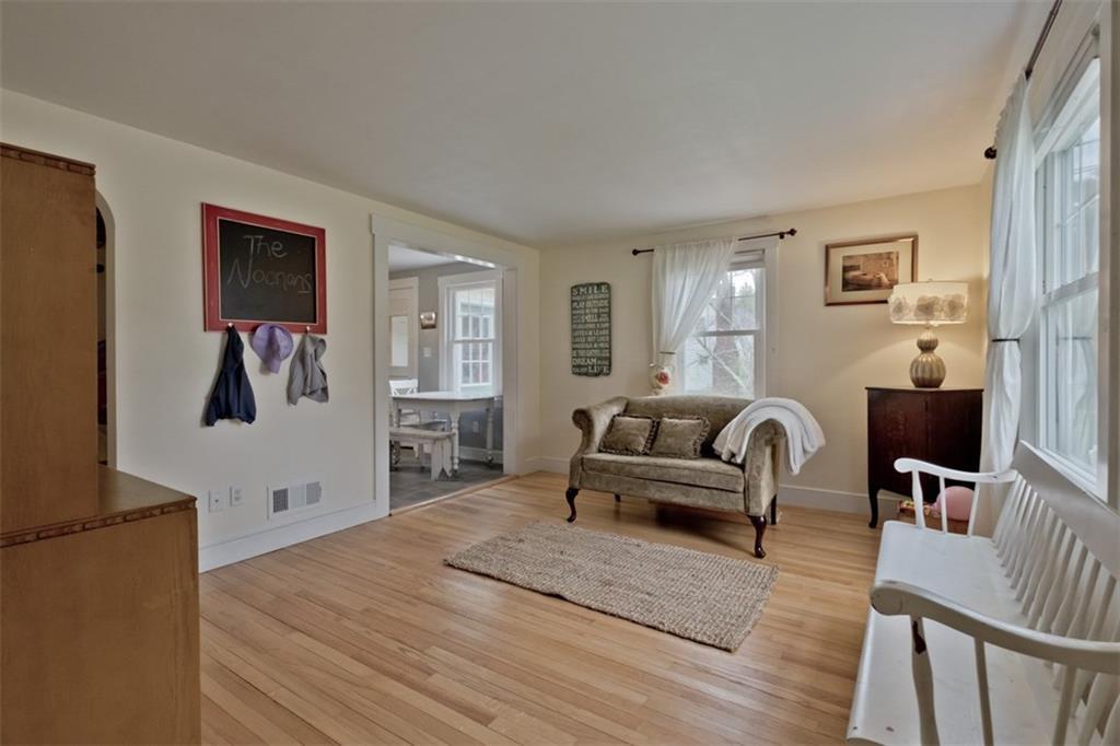 243 Main Street Cumberland Center, ME 04021 - Photo 4 of 28 The living room, opening to the...