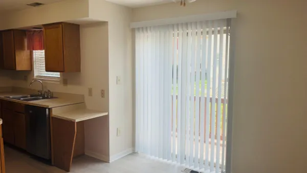 a kitchen with a stove and a sink