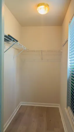 a view of a room with racks on the wall