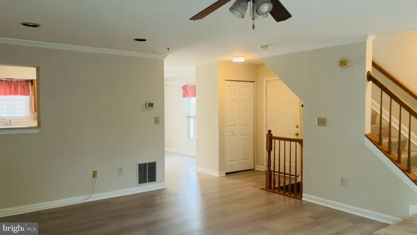 a view of entryway with wooden floor
