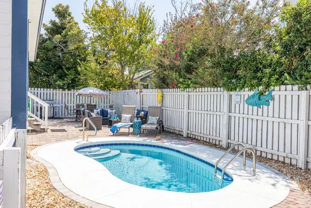 a backyard of a house with seating space