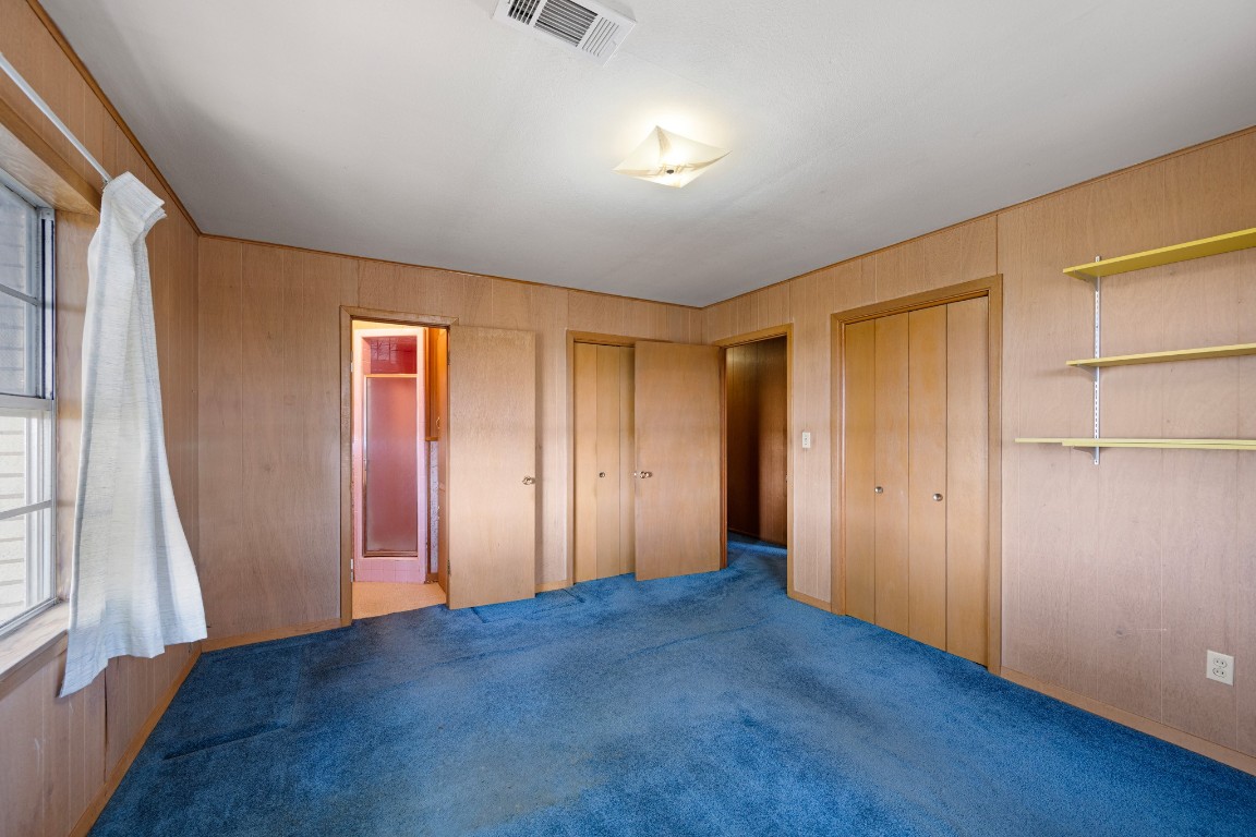 314 County Road 233 Wharton, TX 77488 - Photo 21 of 36 an empty room with windows and closet