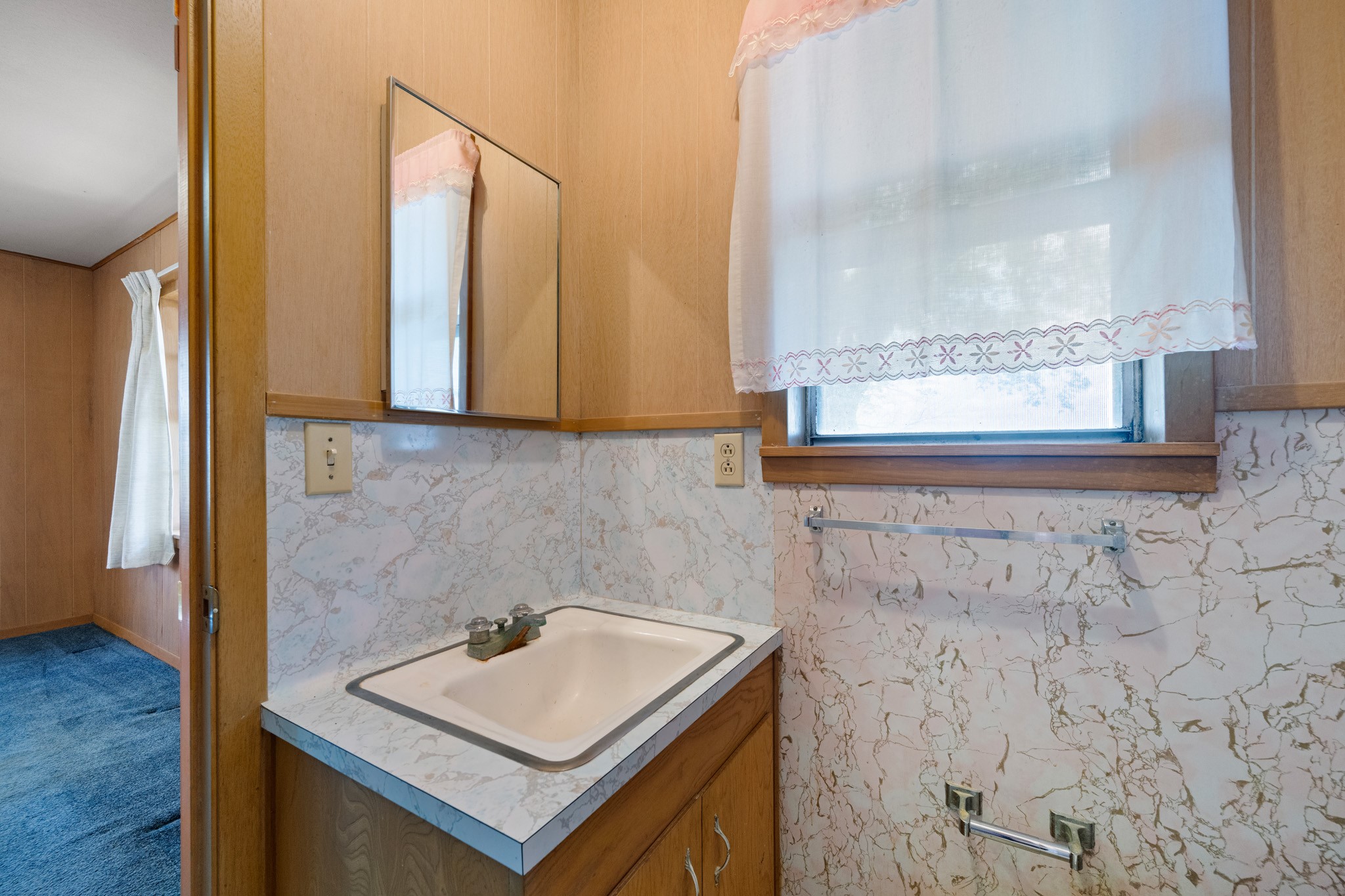 314 County Road 233 Wharton, TX 77488 - Photo 24 of 36 a bathroom with a sink and a mirror