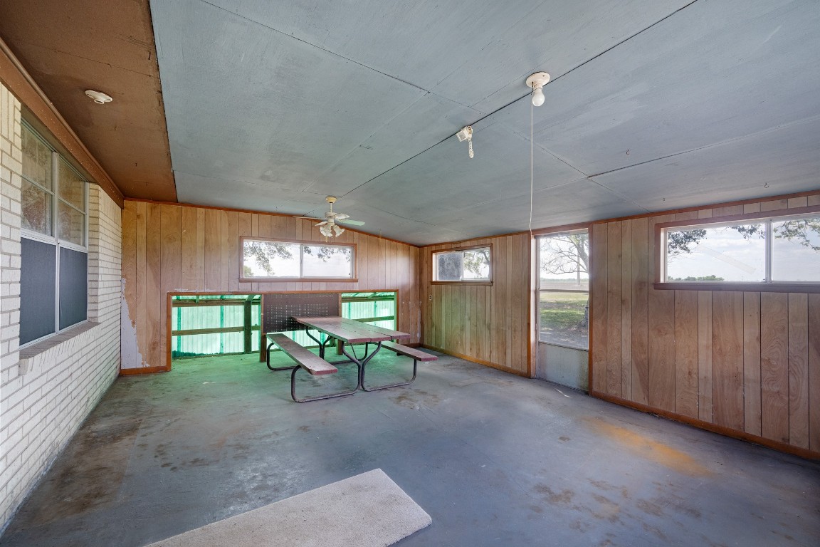 314 County Road 233 Wharton, TX 77488 - Photo 29 of 36 a view of a porch with furniture and a backyard