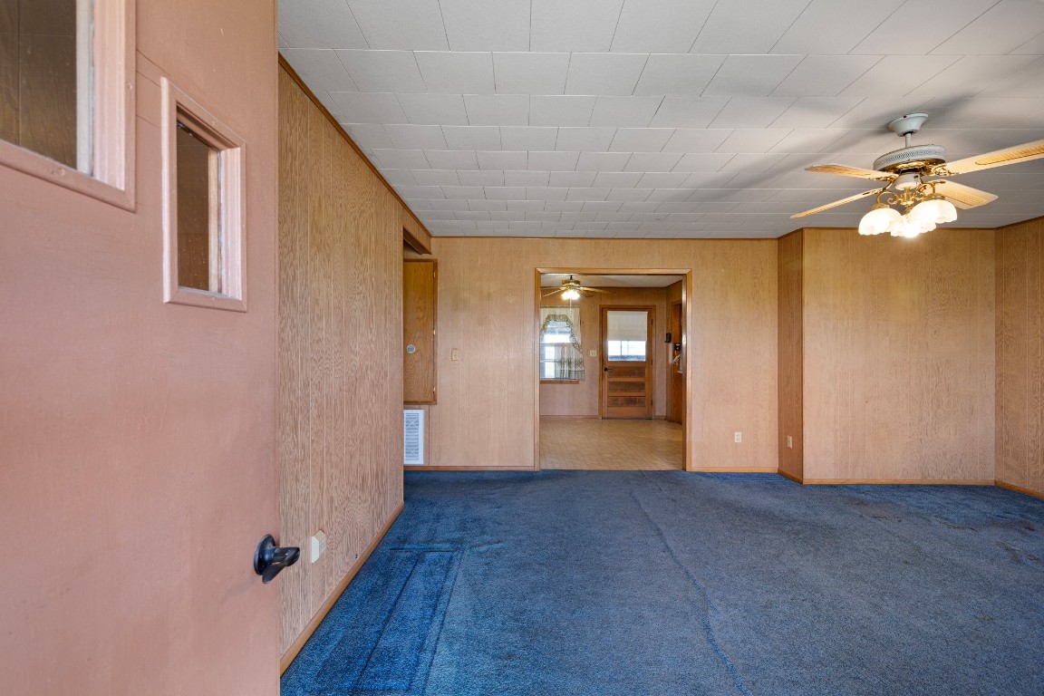 314 County Road 233 Wharton, TX 77488 - Photo 5 of 36 a view of livingroom with hardwood floor and ceiling fan