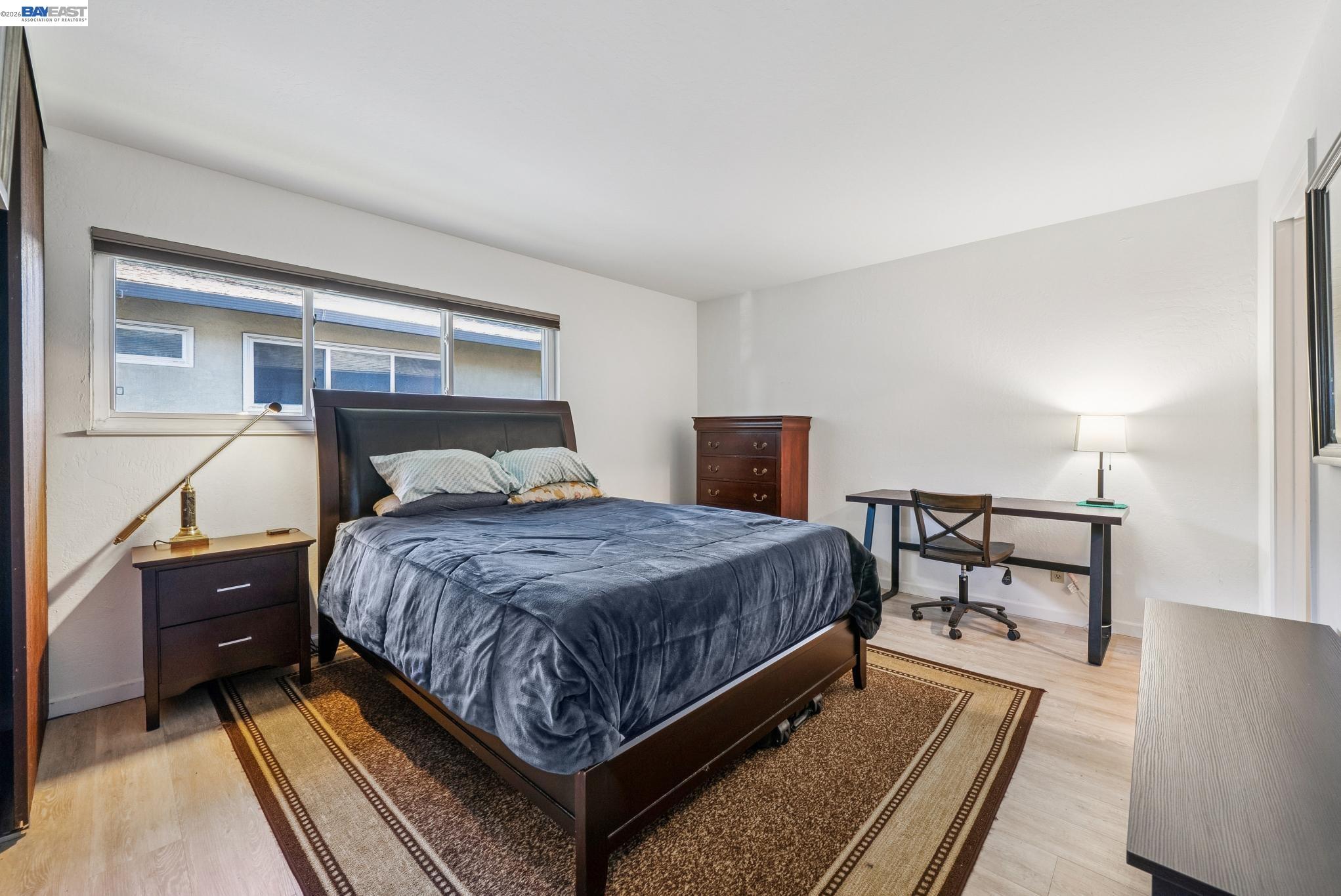 1401 Cottage Street, Unit D Alameda, CA 94501 - Photo 13 of 25 a bedroom with a bed and window