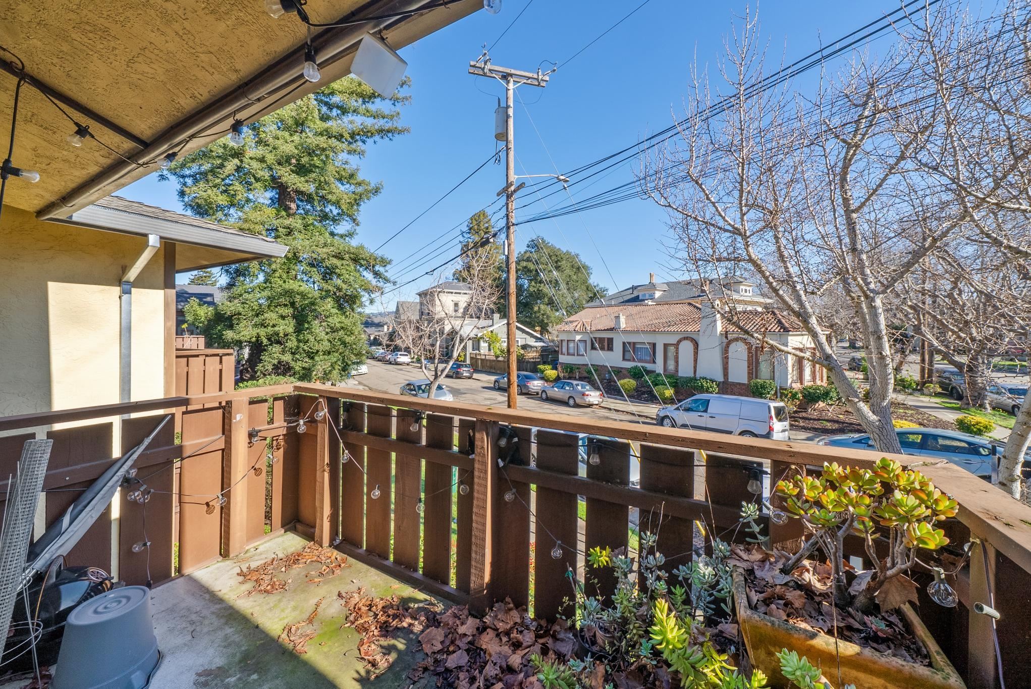1401 Cottage Street, Unit D Alameda, CA 94501 - Photo 20 of 25 a view of a house with a wooden fence