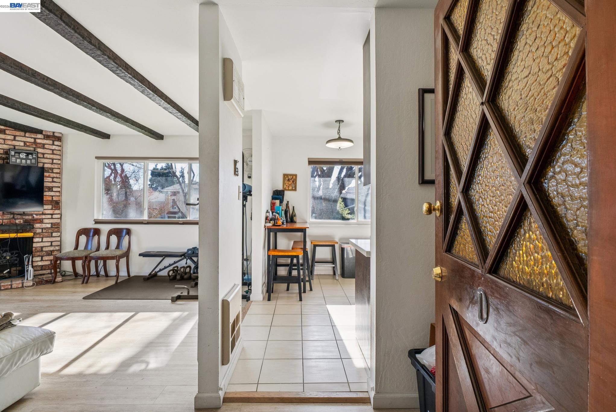 1401 Cottage Street, Unit D Alameda, CA 94501 - Photo 3 of 25 wooden floor with a view of living room