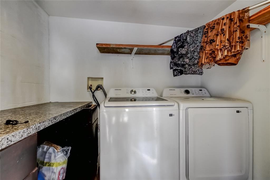 4532 Devonshire Road Tampa, FL 33634 - Photo 32 of 37 a utility room with dryer and washer
