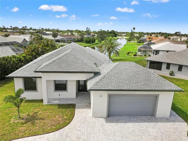 a view of a house with a swimming pool