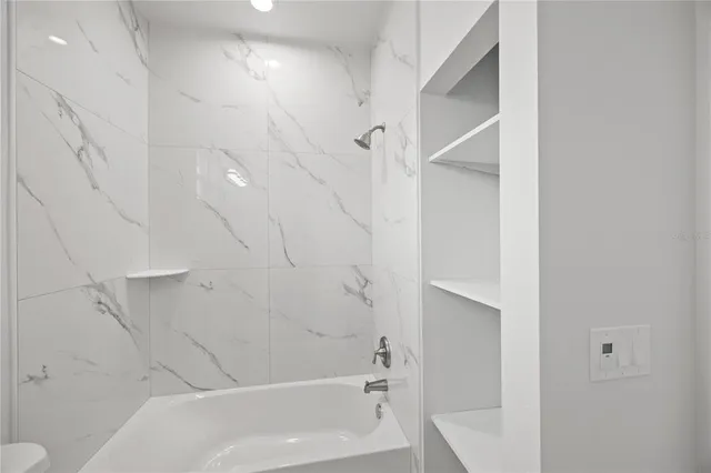 a bathroom with a bathtub