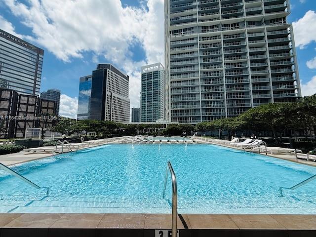 475 Brickell Avenue, Unit 4910 Miami, FL 33131 - Photo 21 of 42 a front view of a house with swimming pool