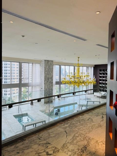 475 Brickell Avenue, Unit 4910 Miami, FL 33131 - Photo 33 of 42 a large swimming pool with a large window