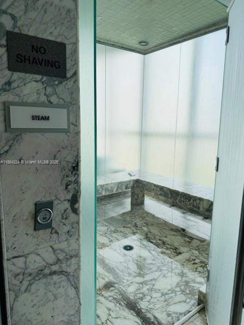 475 Brickell Avenue, Unit 4910 Miami, FL 33131 - Photo 37 of 42 a bathroom with a shower