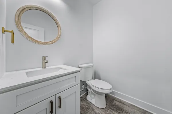 a bathroom with a toilet and a sink