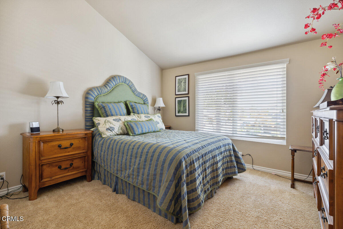 2231 Peninsula Road Oxnard, CA 93035 - Photo 28 of 40 a bedroom with a bed and a window