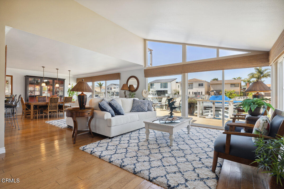 2231 Peninsula Road Oxnard, CA 93035 - Photo 4 of 40 a living room with furniture and a large window