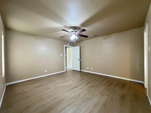127 Timbercreek Lane Lumberton, TX 77657 - Photo 15 of 30 an empty room with fan and windows
