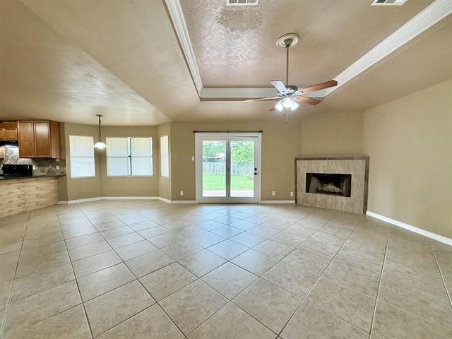 127 Timbercreek Lane Lumberton, TX 77657 - Photo 2 of 30 a view of an empty room with a fireplace and a window