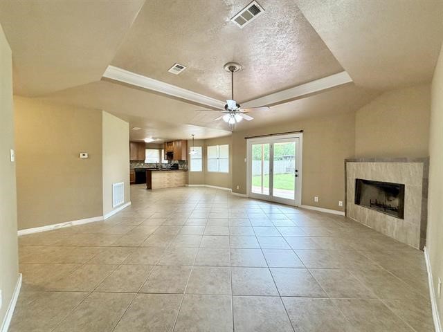 127 Timbercreek Lane Lumberton, TX 77657 - Photo 3 of 30 a view of a livingroom with a fireplace and a chandelier fan