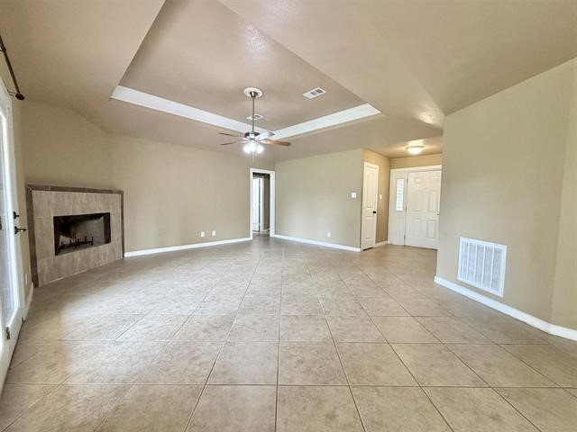 127 Timbercreek Lane Lumberton, TX 77657 - Photo 6 of 30 a view of a livingroom with a fireplace a chandelier and entryway