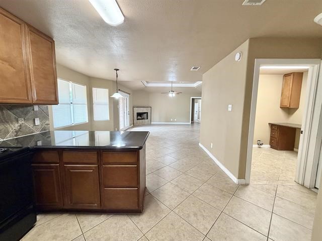 127 Timbercreek Lane Lumberton, TX 77657 - Photo 7 of 30 a open kitchen with stainless steel appliances granite countertop a refrigerator and a sink