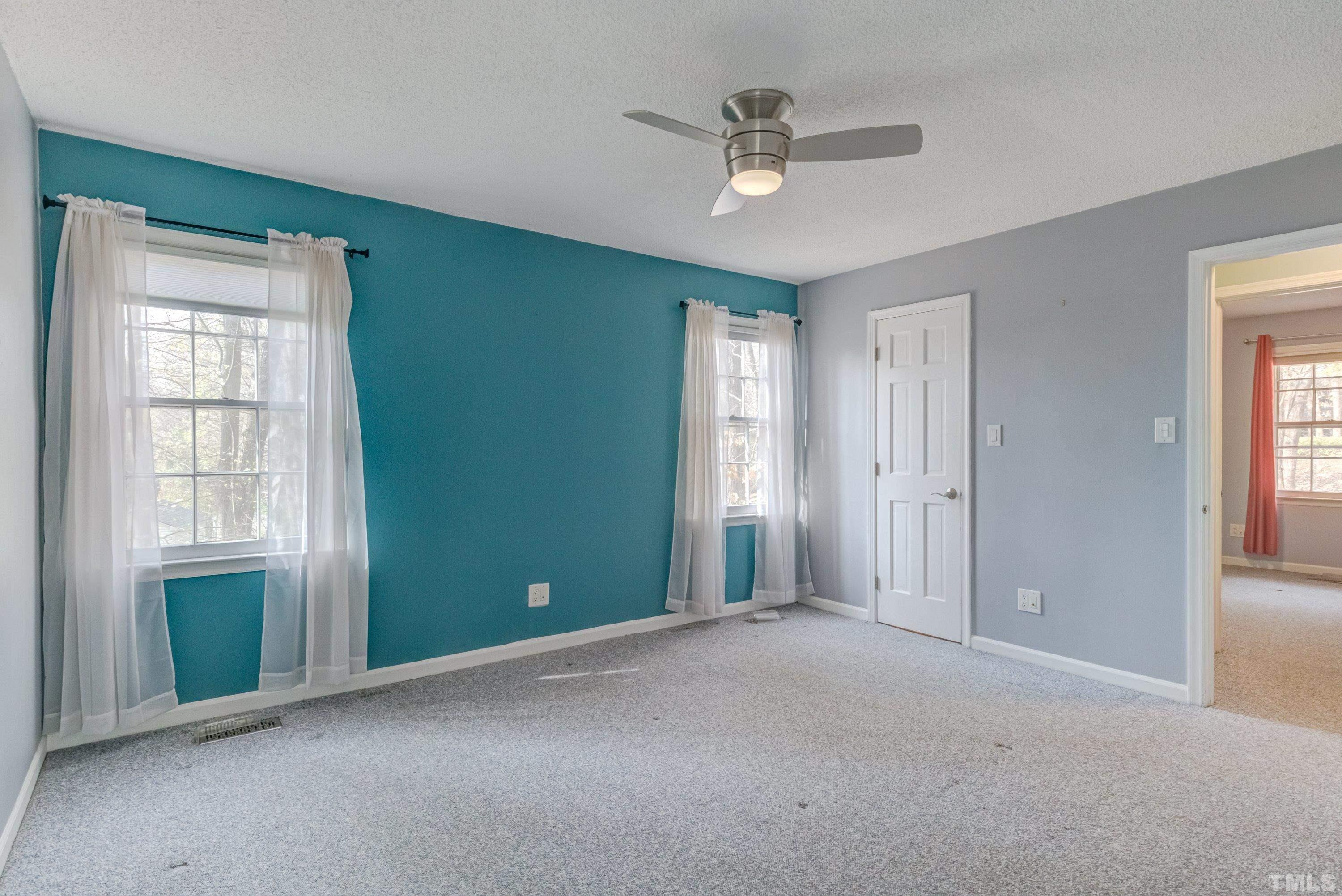 7008 Ray Road Raleigh, NC 27613 - Photo 21 of 36 a view of an empty room with a window
