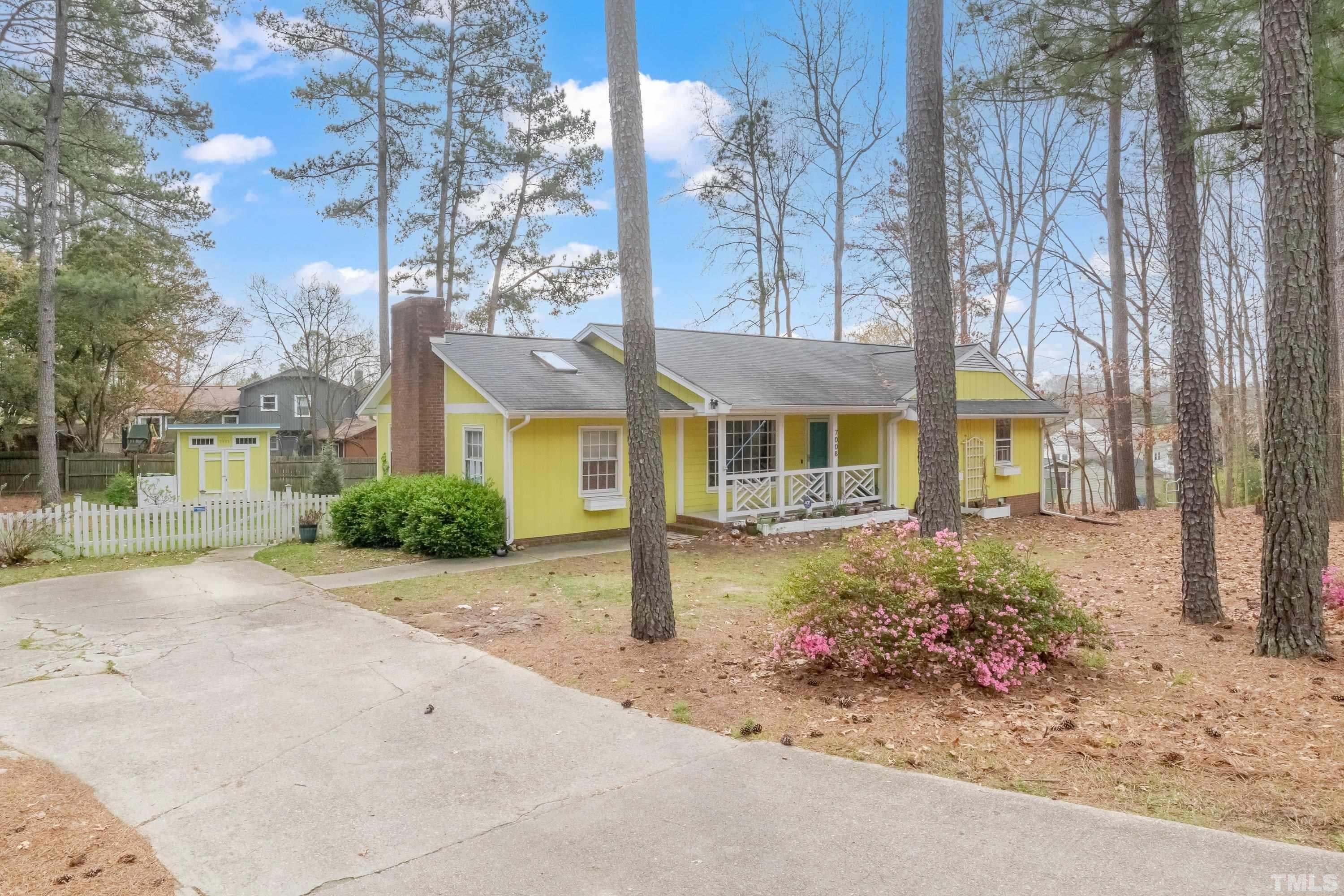 7008 Ray Road Raleigh, NC 27613 - Photo 31 of 36 front view of a house with a small yard