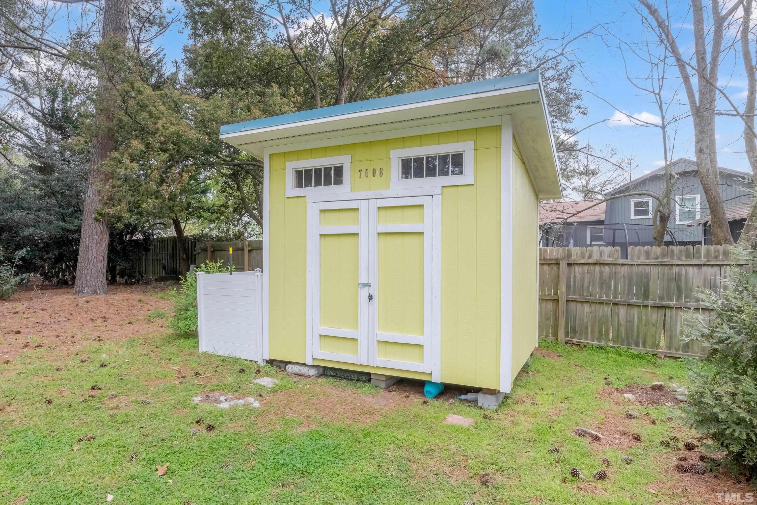 7008 Ray Road Raleigh, NC 27613 - Photo 35 of 36 a view of a house with a yard