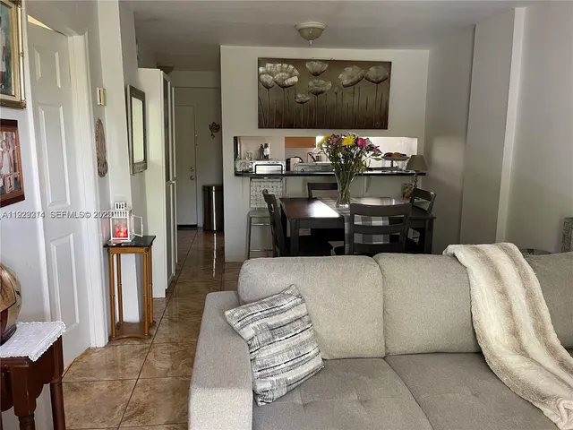 a bedroom with a bed and furniture