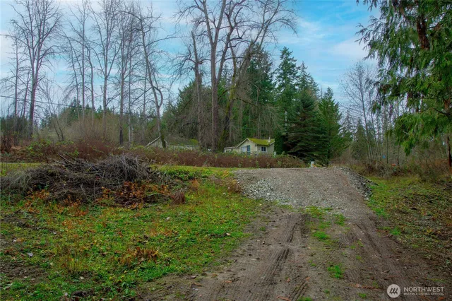 a view of a backyard of a house
