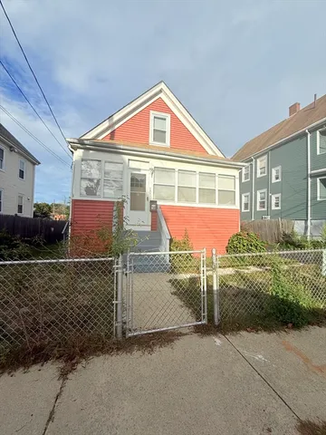 a front view of a house with garage
