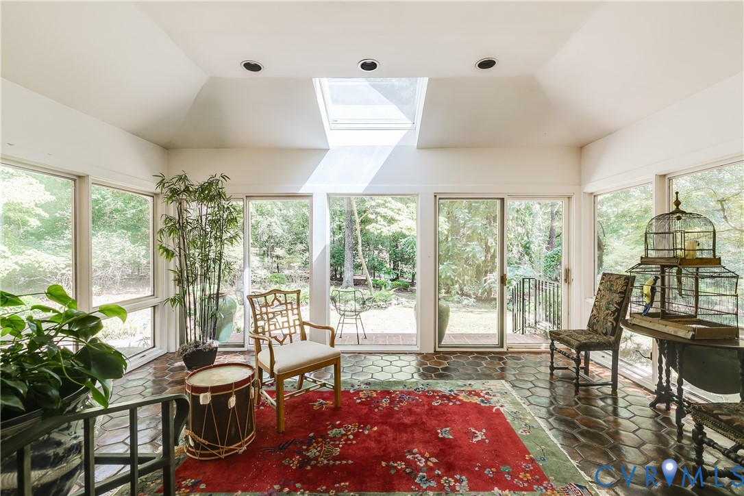10475 Cherokee Road Richmond, VA 23235 - Photo 24 of 74 Sunroom featuring a vaulted ceiling with skylight,