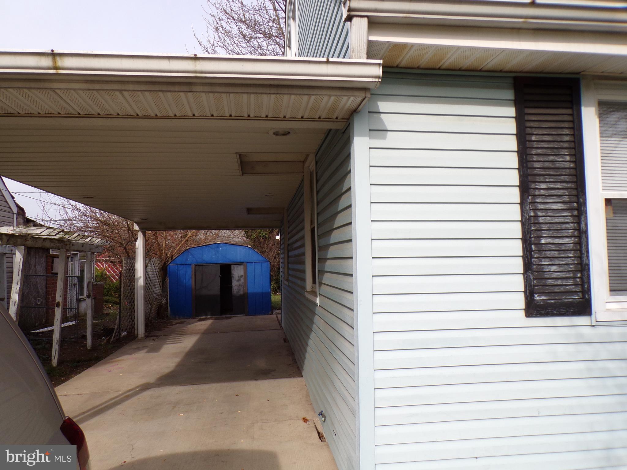 3404 Sollers Point Road Baltimore, MD 21222 - Photo 4 of 28 Front Of House Showing Carport