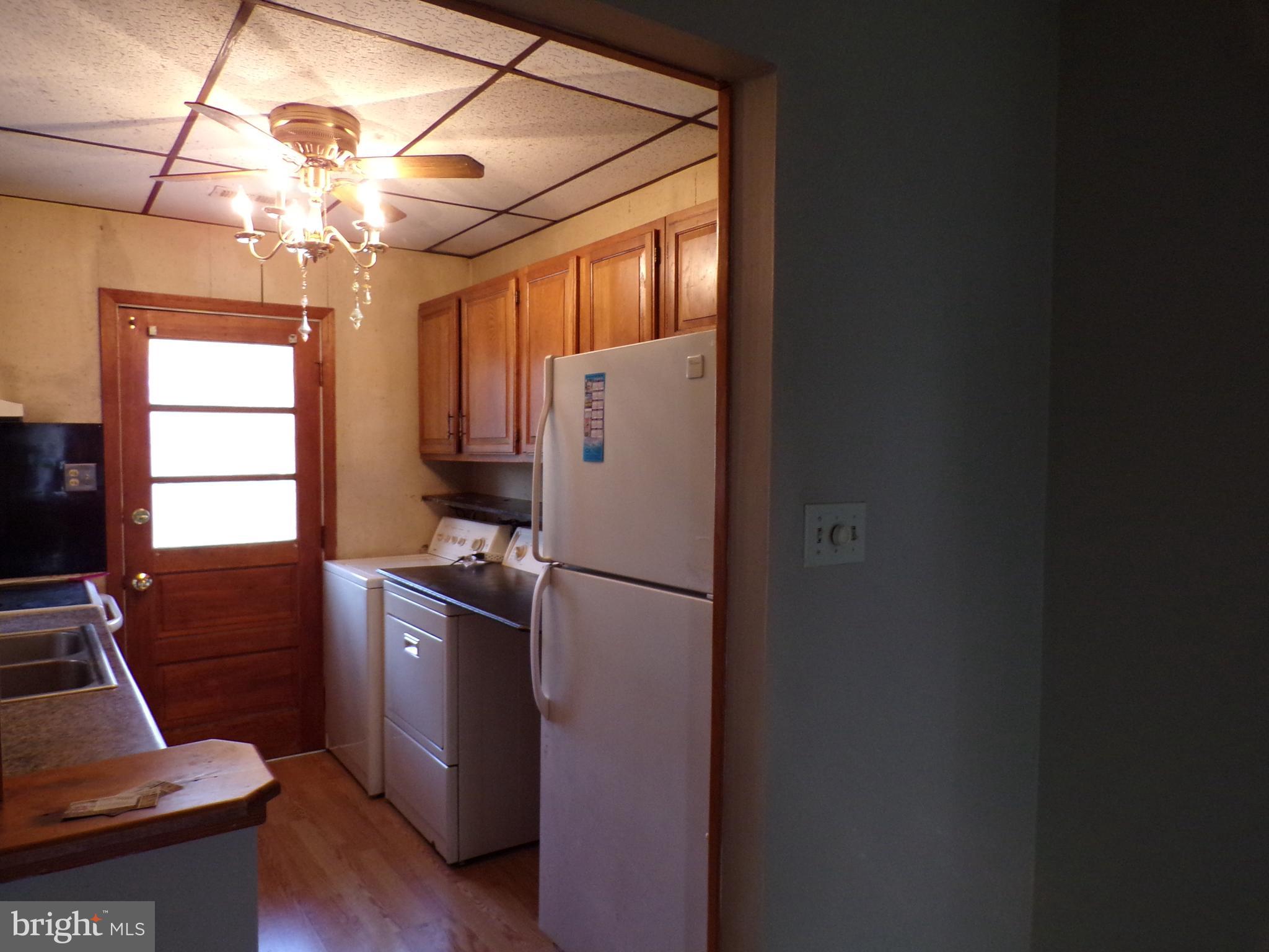 3404 Sollers Point Road Baltimore, MD 21222 - Photo 6 of 28 Kitchen With Laundry Room