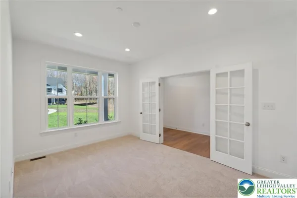an empty room with windows