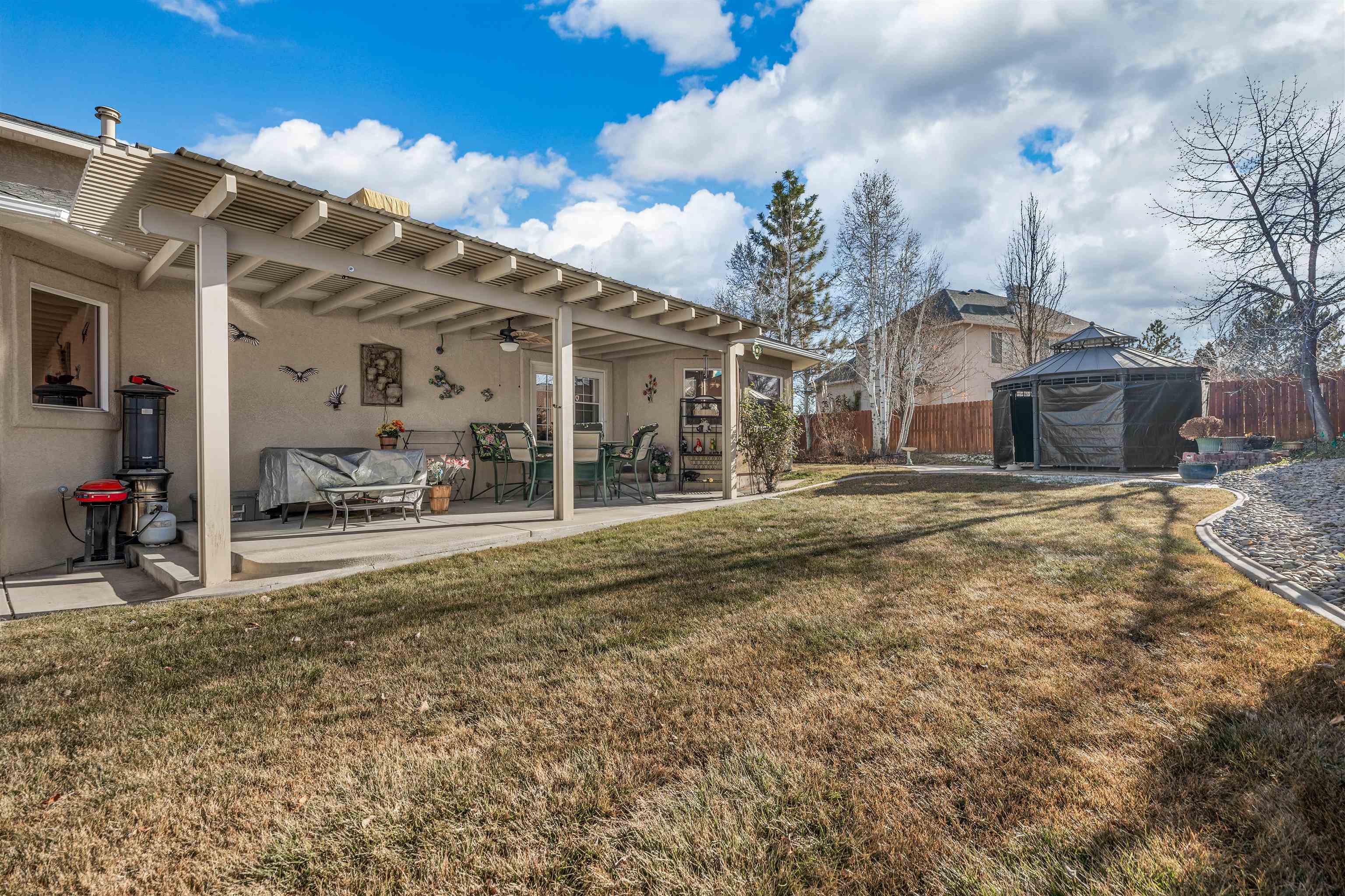 559 Casa Rio Court Grand Junction, CO 81507 - Photo 34 of 42 a view of a house with a outdoor space