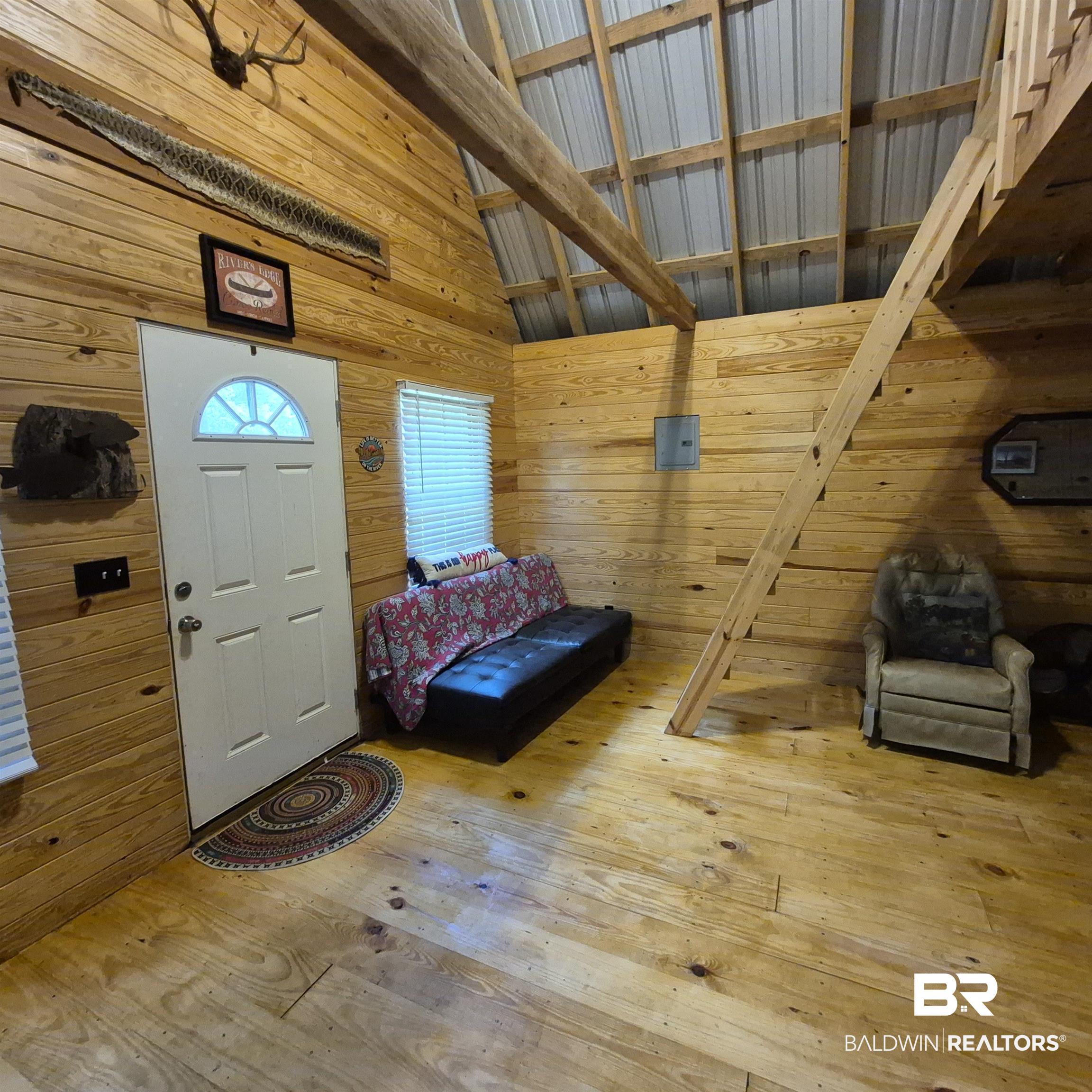 0 Eureka Landing Road Uriah, AL 36480 - Photo 8 of 27 Vaulted ceiling with exposed wood beam and metal roof