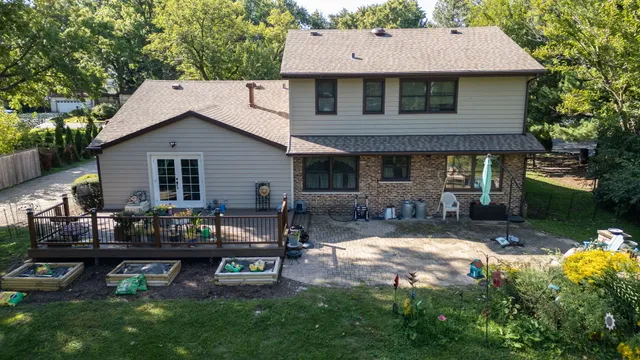 a backyard of a house with seating space and porch