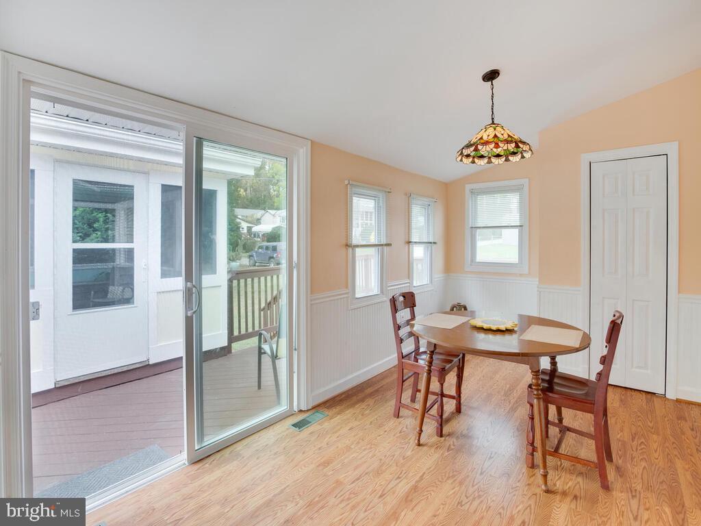 3208 Burgess Road Chesapeake Beach, MD 20732 - Photo 24 of 64 Dining area opens to the back deck