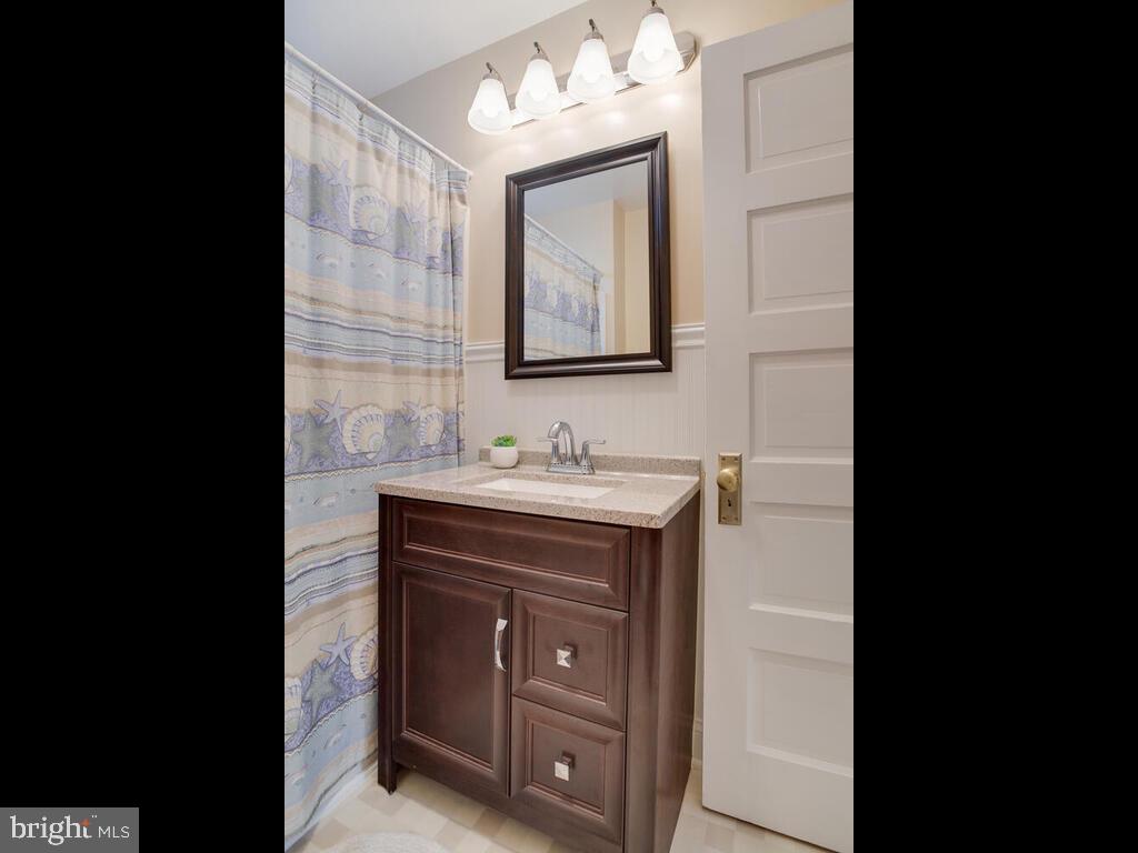 3208 Burgess Road Chesapeake Beach, MD 20732 - Photo 34 of 64 New vanity and light fixture
