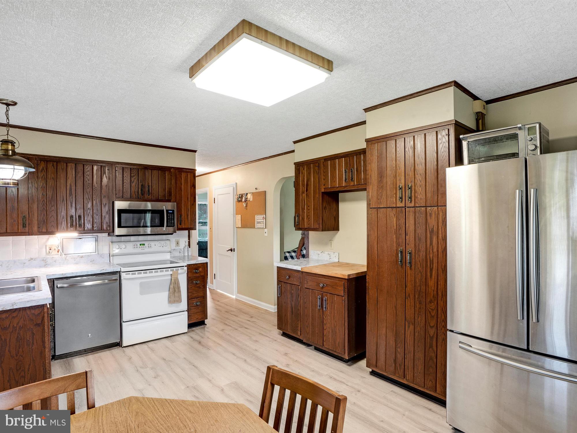 1935 Lancaster Road Manheim, PA 17545 - Photo 10 of 26 New vinyl plank flooring in kitchen