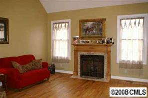 2044 Roadrunner Road Clover, SC 29710 - Photo 2 of 7 a living room with furniture and a fireplace