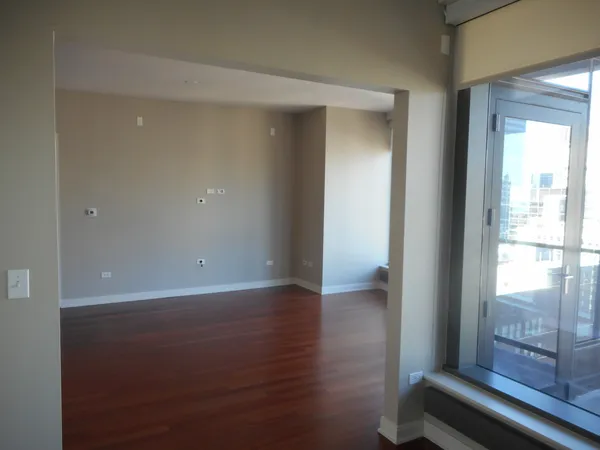 a view of a glass door and a window