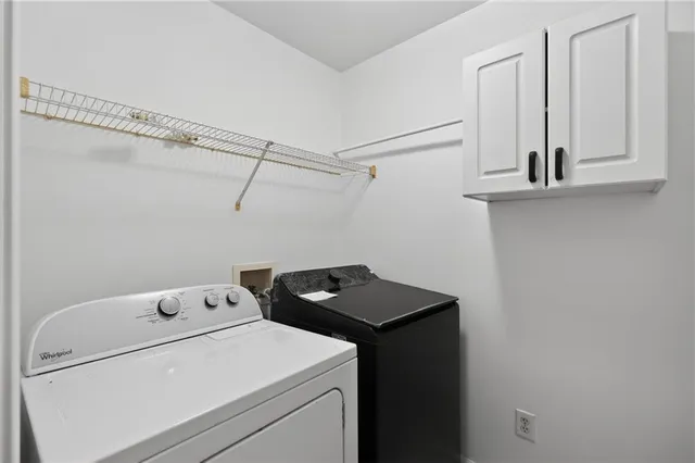 a view of a storage & utility room with wooden floor
