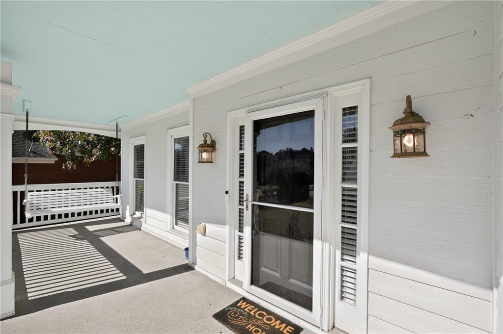 10950 Regal Forest Drive Suwanee, GA 30024 - Photo 4 of 52 a view of a bedroom from a hallway