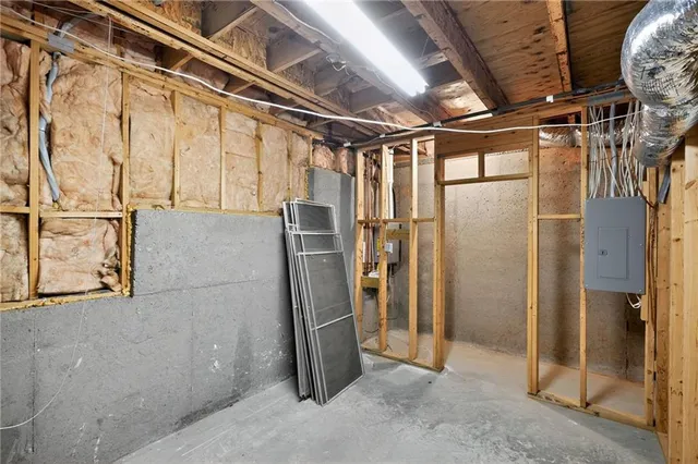 a view of a house with wooden deck